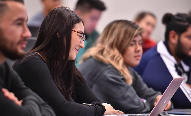 Graduate students sitting in a classroom